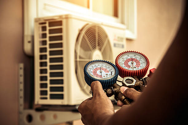Professional Heat Pump Repair technician working in Saint Henry, OH